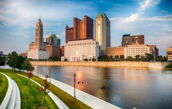 Daytime river cityscape with buildings